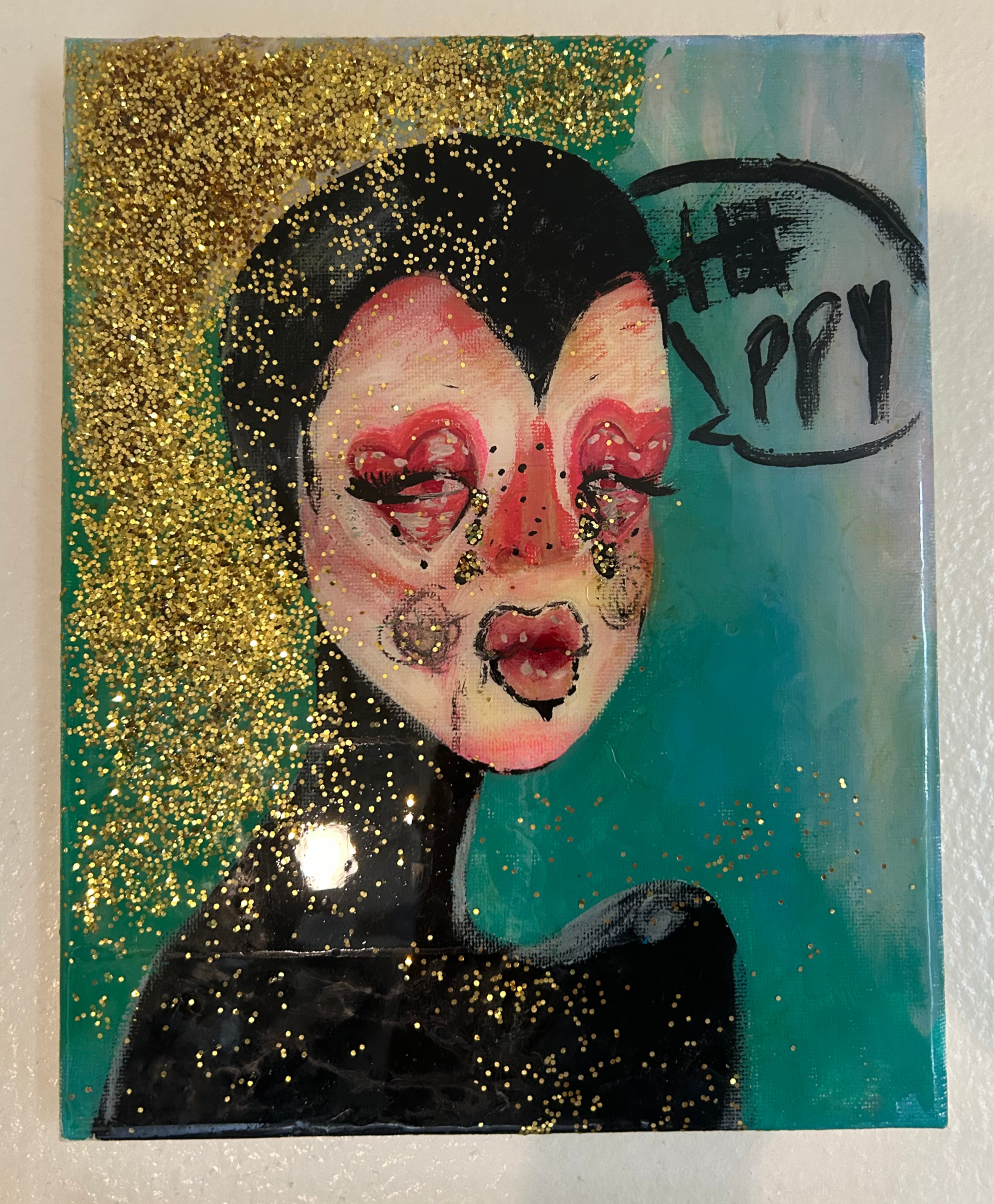 Portrait with pink eye makeup and gold glitter on turquoise