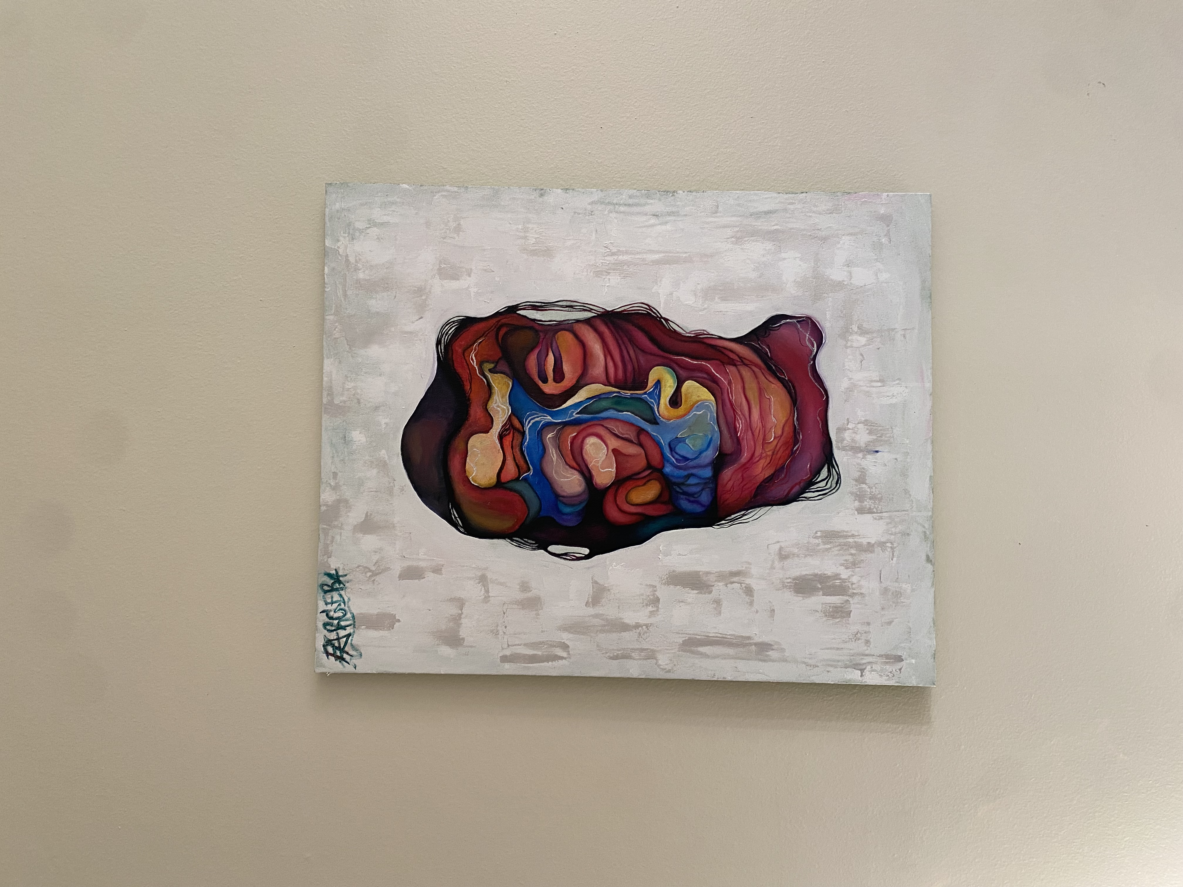 Abstract multicolored face on a white canvas